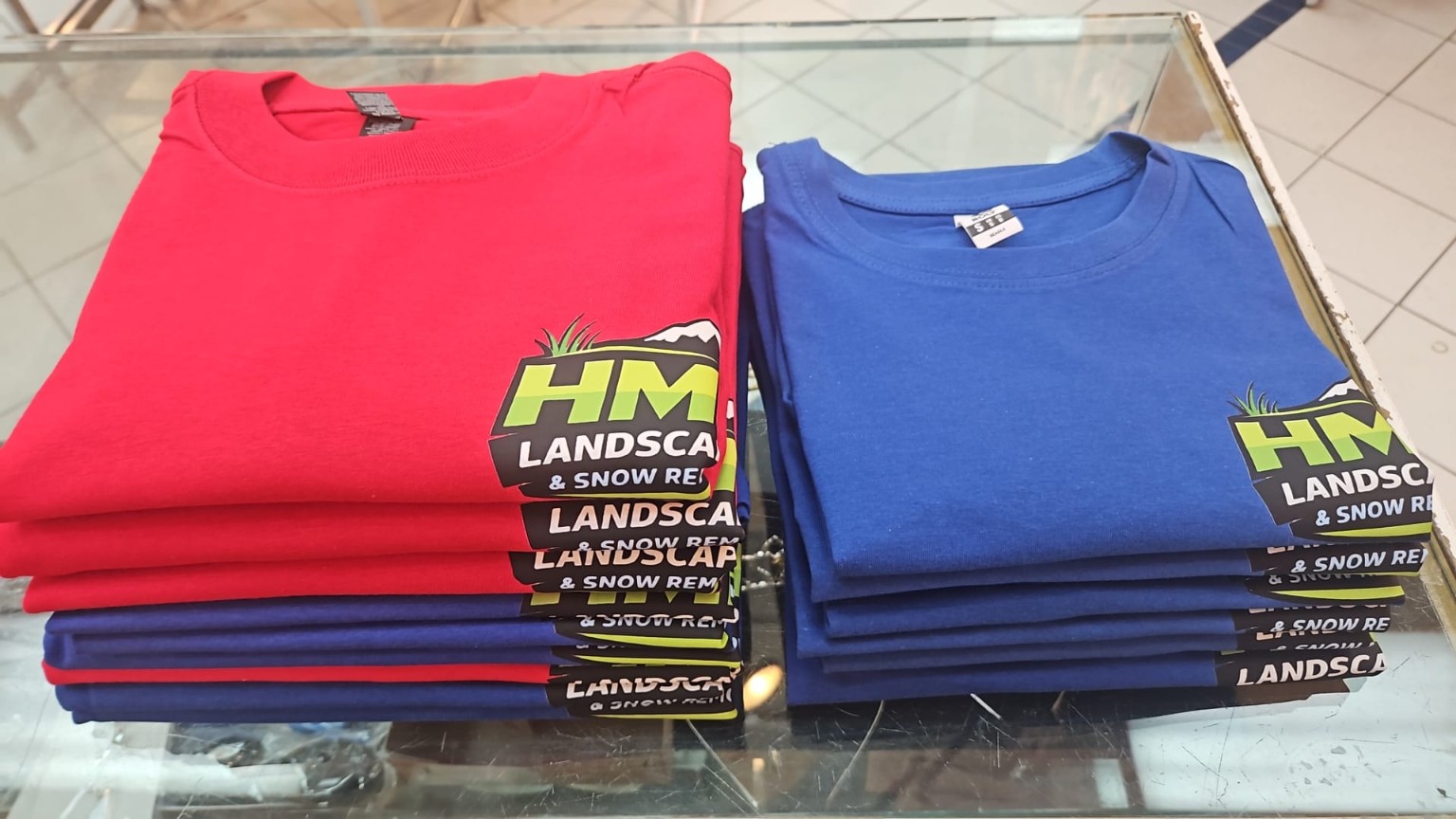 Custom business shirts printed for a landscaping company